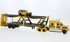 Maisto International Autotransporter, gelb/schwarz, 1:64, Hot