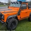 Solido Land Rover Defender 90, orange, 1:18,