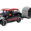 Motormax Mini Cooper S All4 Countryman, schwarz/rot, 1:24, Best