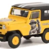 Greenlight Nissan Patrol, gelb/schwarz, 1965, Smokey Bear, 1:64, Outlet