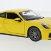 Welly Porsche 911 (992) Carrera 4S, gelb, 2019, 1:24, Best